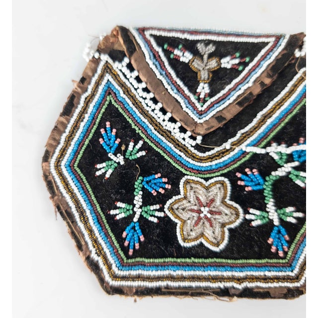 We are selling this nice 19th century Northeast Woodlands Indian beaded pouch or bag, most likely Iroquois. The bag has...