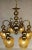 Nice authentic retro vintage chandelier, golden color holder with patina, 6 light elements made of yellow notched glass,...