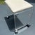 This elegant vanity stool is crafted from clear Lucite with a comfortable vinyl seat. Designed in a classic Mid-Century...