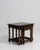 A sophisticated set of three French nesting tables from circa 1970 exemplifies the clean, understated elegance that...