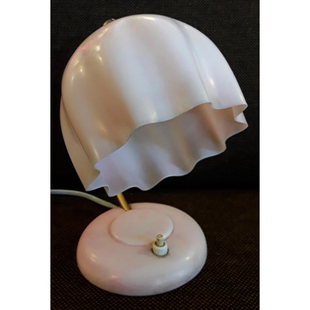 Table Lamp in Bakelite With Gold Painted Metal Bow, 1930s, in Good conditions. Designed 1920 to 1949 European Plug (up to...