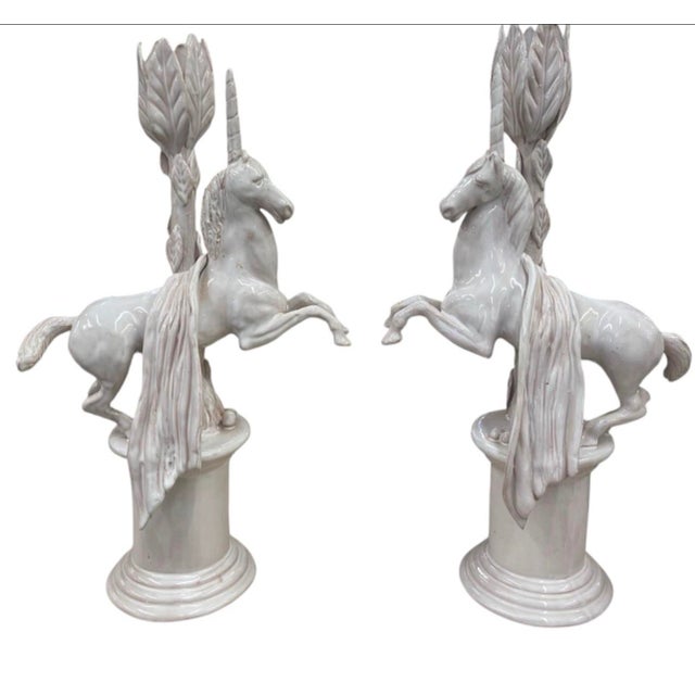 Add a touch of mythical elegance and vintage charm to your home decor with this striking pair of vintage ceramic...