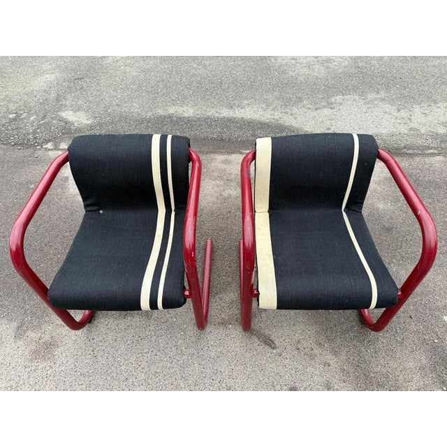 Striking example of Danish modernism, this authentic pair of cantilever armchairs by Knud Friis & Elmar Moltke Nielsen...