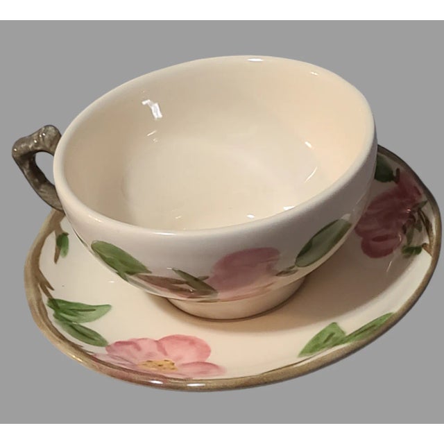 This vintage teacup and saucer set is a delightful addition to any collection. The set includes six pieces, each crafted...