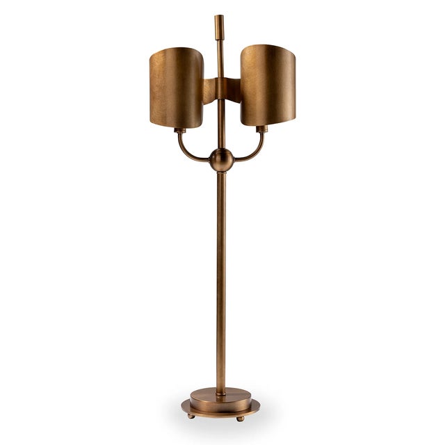Our Quinton lamp is classic and undeniably modern with a deco nod. Featuring double sconces with hand curled metal shades,...