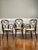 Set of three midcentury bentwood armchairs with a round cane seat by the renowned workshop of Salvatore Leone, Italy,...