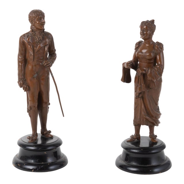 A Pair of Patinated Bronze Sculpture of a Couple For Sale