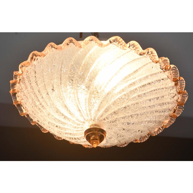 Stunning pink and transparent/silver Murano ceiling light. The ceiling light consists of two glass elements, the central...