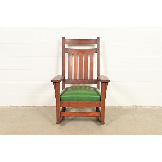 A gorgeous antique Mission or Arts & Crafts period rocking chair In the manner of Stickley Brothers USA, Early 20th...