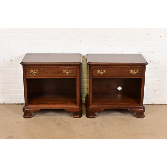 A gorgeous pair of Georgian or Chippendale style nightstands or end tables By Ethan Allen USA, Circa 1970s Solid cherry...