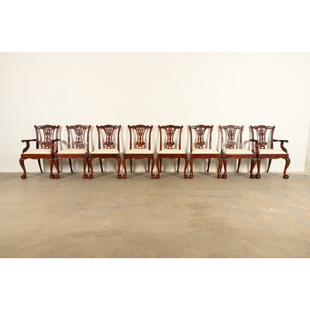 An outstanding set of eight Chippendale or Georgian style dining chairs In the manner of Baker Furniture USA, Circa 1980s...