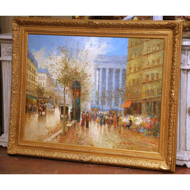 Painted in the late 20th century, this vibrant oil on canvas captures a lively Parisian street scene animated by figures,...