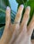 Nine earth-mined diamonds sparkle across this beautifully crafted, minimalist solid 14K white gold band. Clean and modern,...