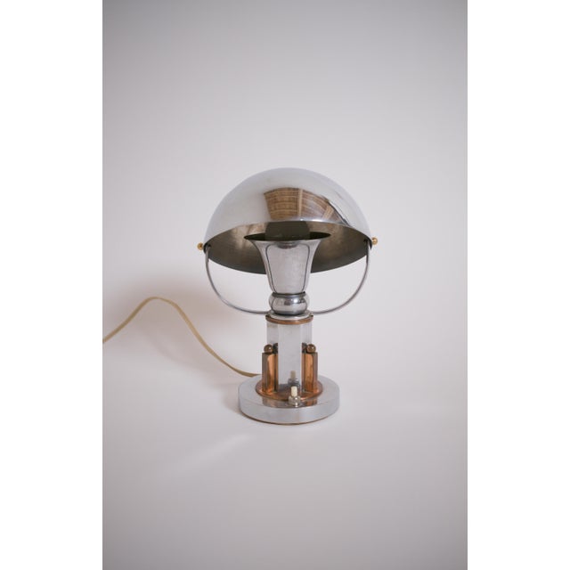 Modernist Streamline lamp in copper and chrome, late Art Deco French work. France, circa 1935. with its large...