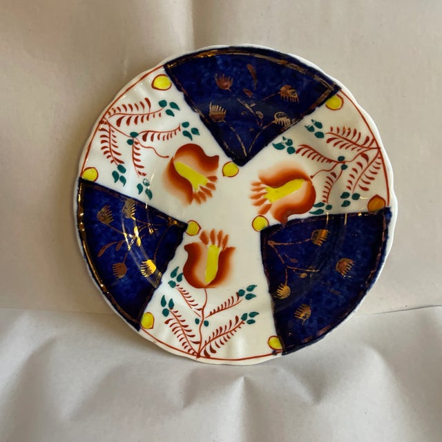 Decorative uses in a cabinet or hanging on a wall. Three cobalt blue lobed pyramidal panels with luster radiating from the...