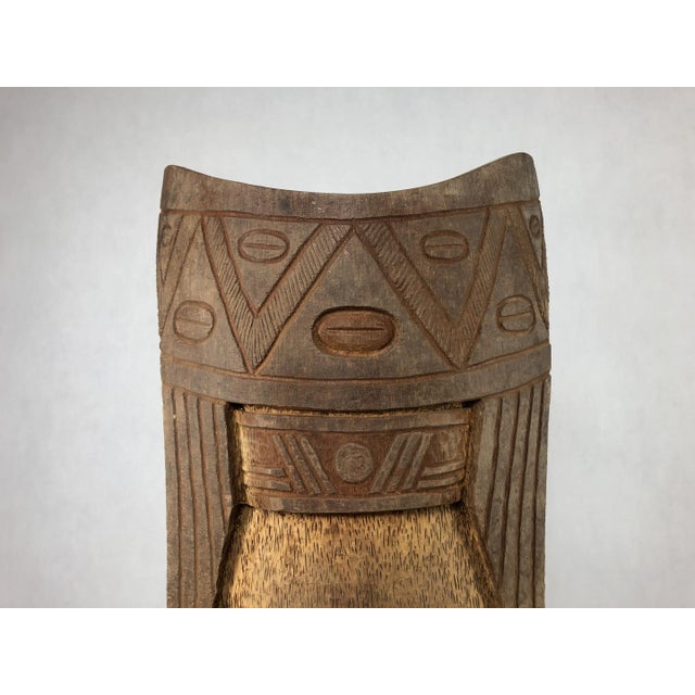 An unusual throne-type seat, constituting a large sculpture in itself. Made of wood in combination with an unknown...