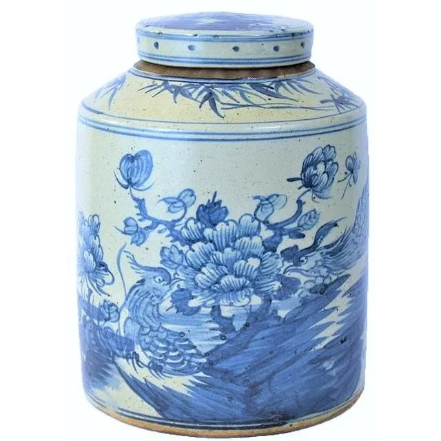 This is a beautiful Blue and White Porcelain large Cylinder Tea Jar. It is decorated with beautiful mums and field birds....
