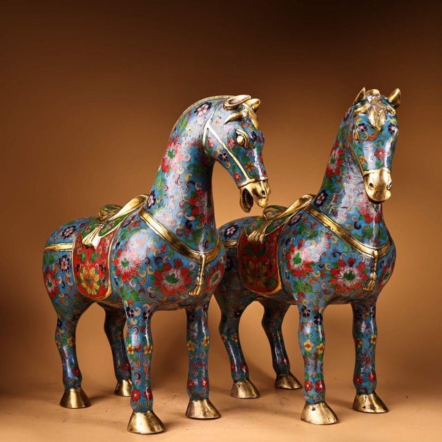 This is a matching pair of cloisonné enamel figurines in the form of standing horses, featuring intricate wire inlay and...