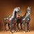 This is a matching pair of cloisonné enamel figurines in the form of standing horses, featuring intricate wire inlay and...