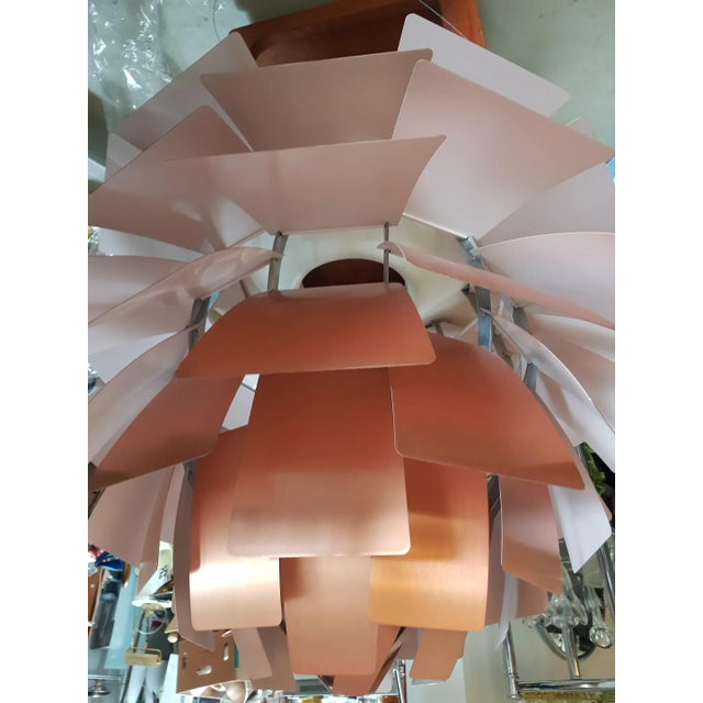 This is the rare Copper Rose Model that was produced till the end of the Seventies. The light was only hung once and...