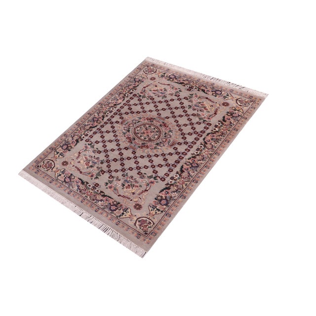 Designed with mesmerizing intricacy and gorgeous color palette, this hand-knotted masterpiece demonstrates the beauty and...