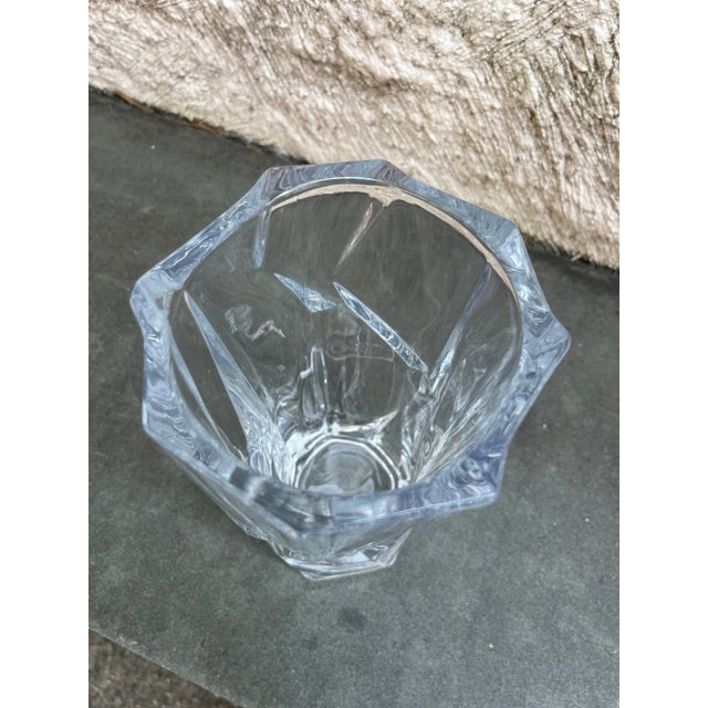 Contemporary geometric design lead crystal clear vase. The vase is not marked but glows under black light.