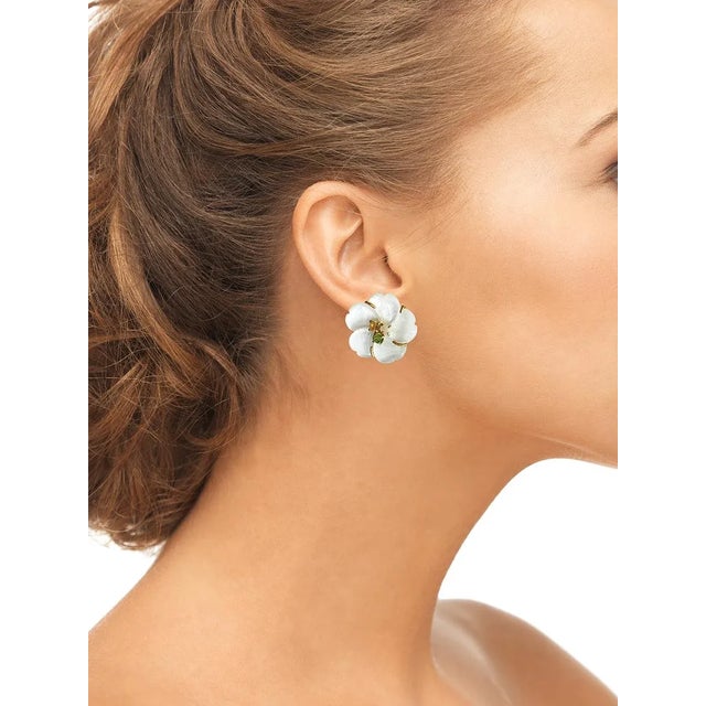 Mother of Pearl Flower, Peridot, Moonstone & Citrine Semi Precious Stones Measures 1 1/4 " x 1 1/4" Comes with a hook for...