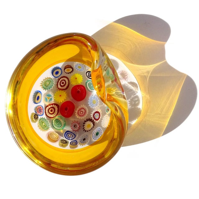 Beautiful and rare, vintage Murano hand blown Millefiori flower canes and orange "Incalmo" rim Italian art glass bowl. The...
