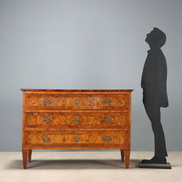 Neoclassical chest of drawers from the last quarter of the 18th century, originating from Emilia, featuring a walnut and...