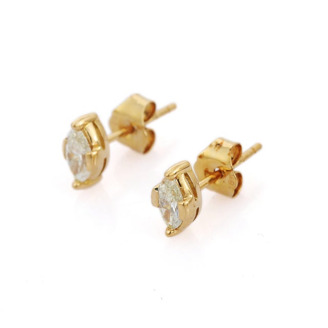 Discover the elegance of our handcrafted 18K solid gold marquise diamond studs. Featuring prong-set, brilliant marquise...