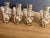 A set of four figural snowman place card holders by International Silver Company, finished in bright silverplate. Late...