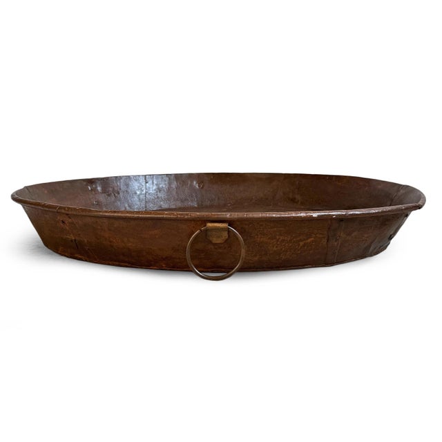 Vintage large rustic industrial style round iron tray from India. Hand-formed from heavy-gauge iron, its broad, shallow...