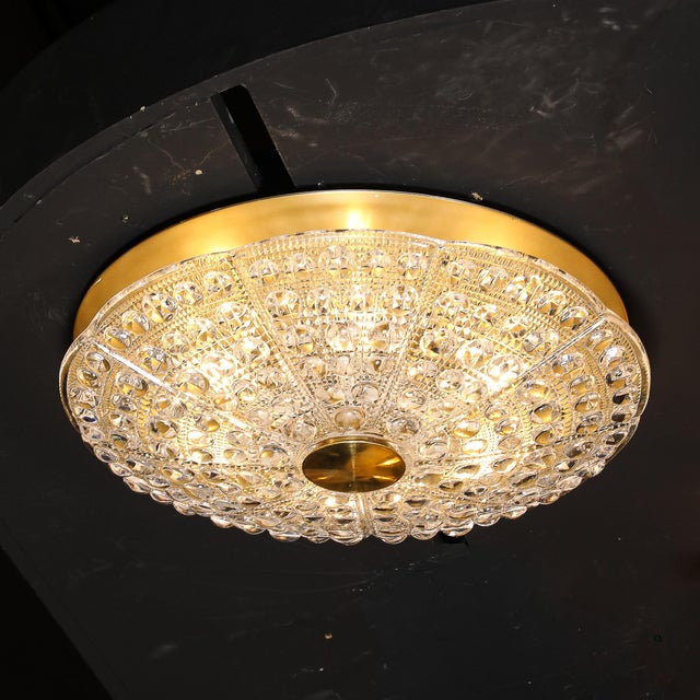 Mid-Century Modernist flush mount chandelier by Carl Fagerlund for Orrefors. This flush mount features a stunning pressed...
