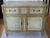 Beautifully painted faux marble carved wood cabinet in the French manner wonderful patina single drawer atop two doors.