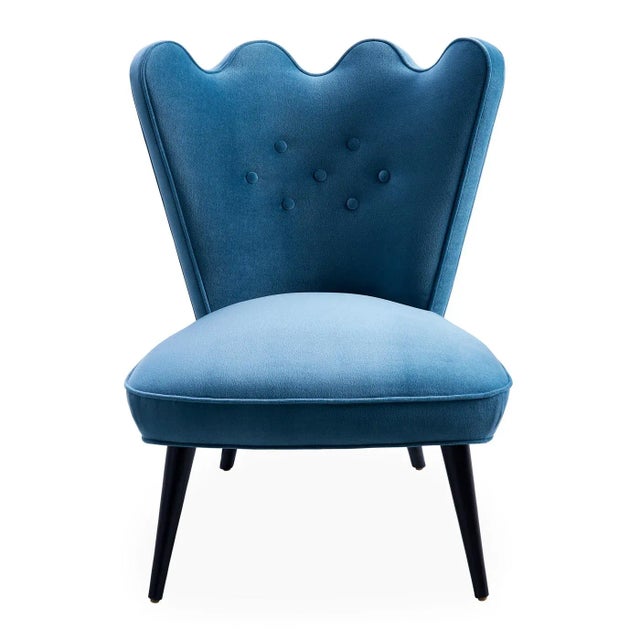 The tailored slipper chair just got ultra-comfy. Ripple's gentle back curve catches you in a hug at every angle, and its...