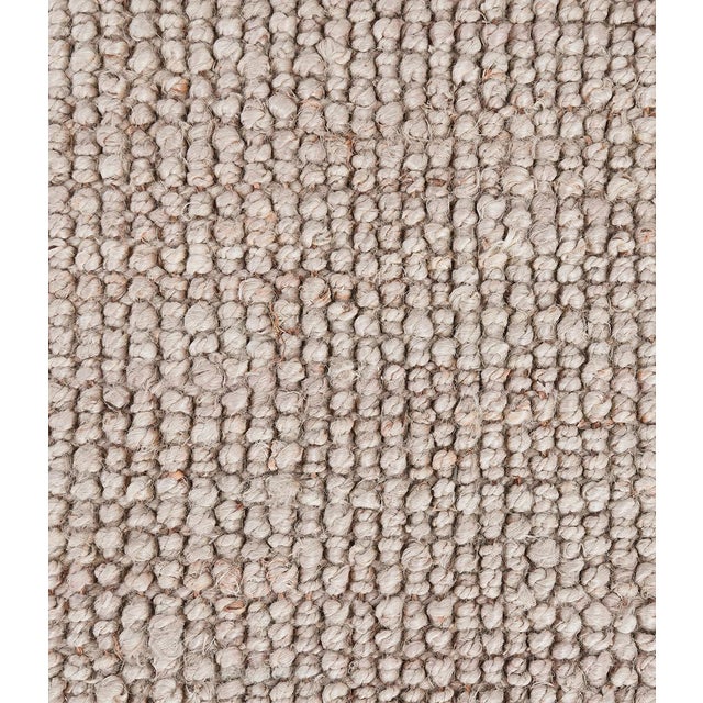 Boucle style weave 100% jute rug in a soft neutral oat color. Available in numerous sizes. Please note that its appearance...