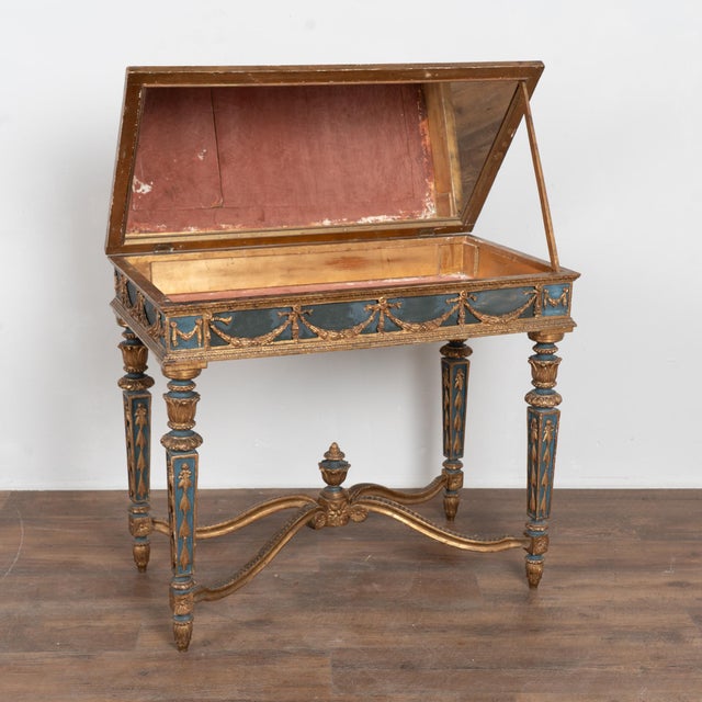 19th Century Swedish Giltwood & Blue Side Table with Hidden Storage 19th-century Swedish side table crafted in carved wood...