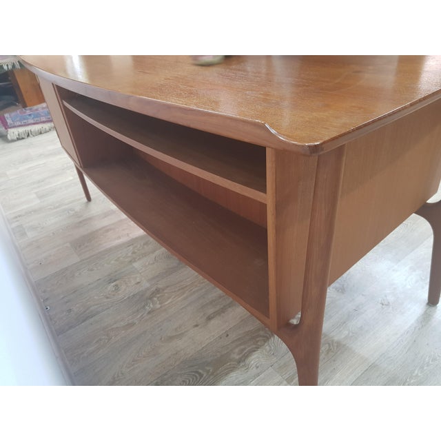 A designer desk designed by svend aage madsen for the danish factory hp hansen in the 1960s. Made of teak wood. It has...