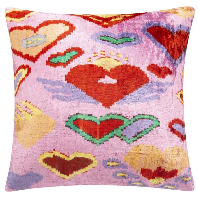 "Transform your living space with this exquisite 20x20-inch handmade silk velvet throw pillow, showcasing a charming pink...