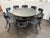 Design Plus Gallery presents the Klismos Outdoor Pedestal Table + Eight Klismos Chairs from Restoration Hardware. Inspired...