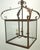 Simple and elegant extra large iron hanging lantern with Spanish influenced details. Glass sides with open bottom and...