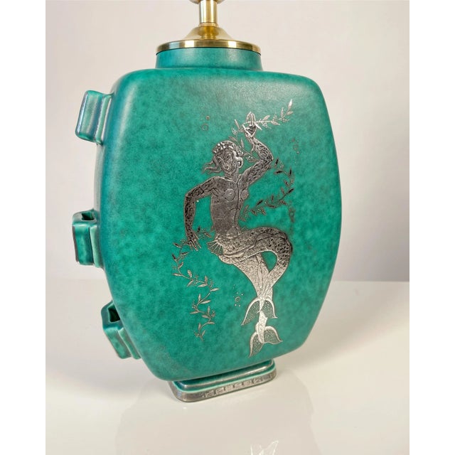 Rare "Argenta" stoneware table lamp decorated with silver decor. The "Argenta" series was introduced at the Stockholm...