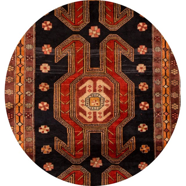 Vintage hand-knotted Persian Heriz rug with a geometric motif. This piece has magnificent detailing and a beautiful...