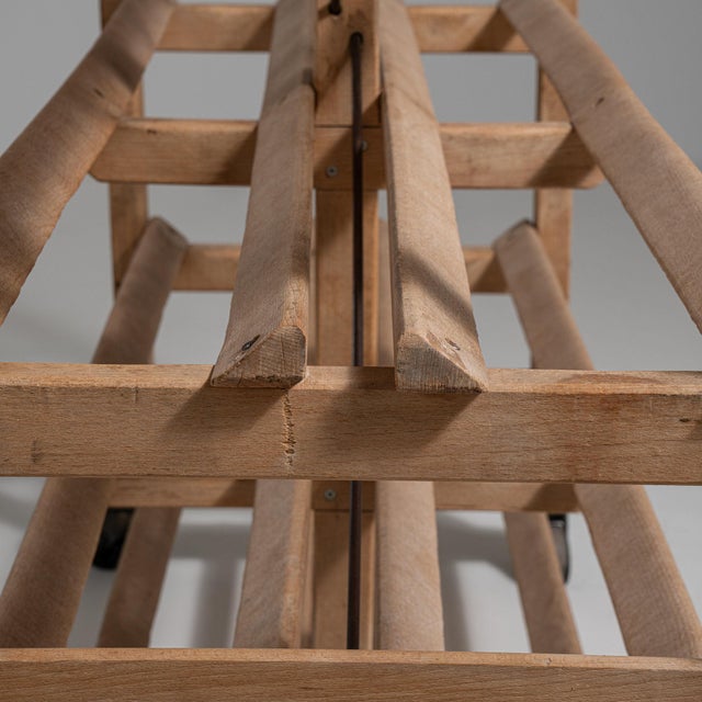 This piece presents as a piece, distinguished by natural weathered pine, castor wheels. Originating in France during 20th...
