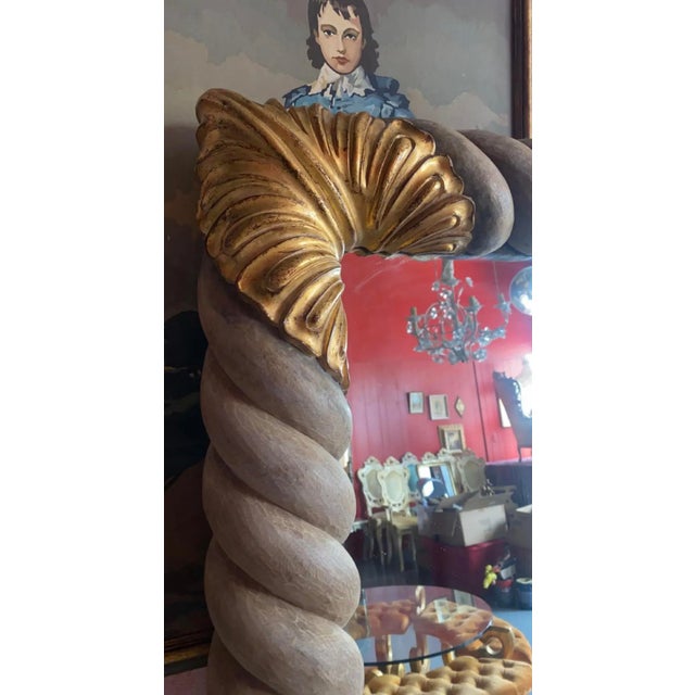 Vintage wooden carved mirror with gold gilt detailing. Mid-century Hollywood regency. Has hardware to be hung but is very...