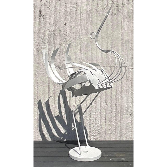 Make a soaring statement with this monumental vintage wrought iron crane sculpture. Standing tall on a sturdy circular...