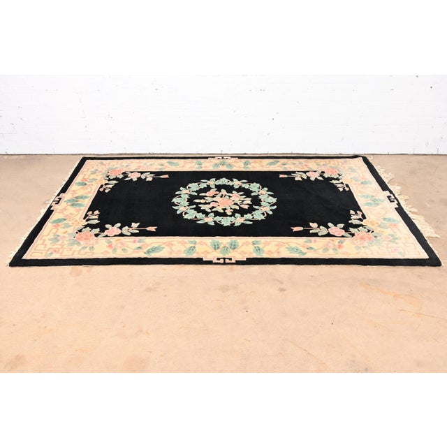 A beautiful hand made vintage Chinese sculpted wool area rug China, Mid-20th Century Nice floral design, with predominant...