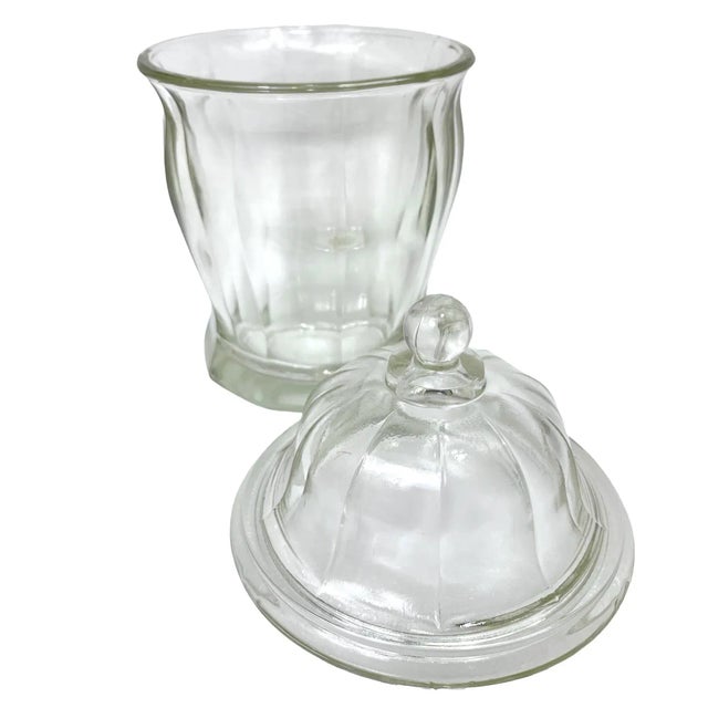 Add a charming touch to your kitchen with this wonderful glass biscuit or apothecary jar with lid by the Indiana Glass...