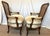 A pretty pair of classic French bergère chairs from the mid 20th century. They have a beautifull carved solid wood frame...