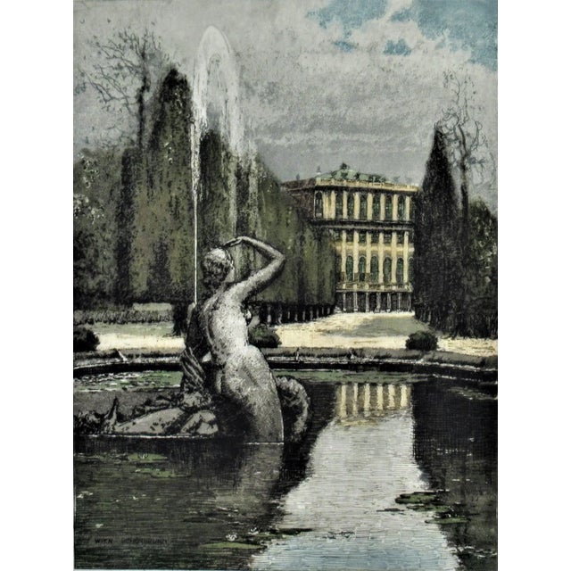 This artwork titled "Vienna, Schoenbrun Castle" c.1960 is a color etching by noted Austrian artist Josef Eidenberger,...